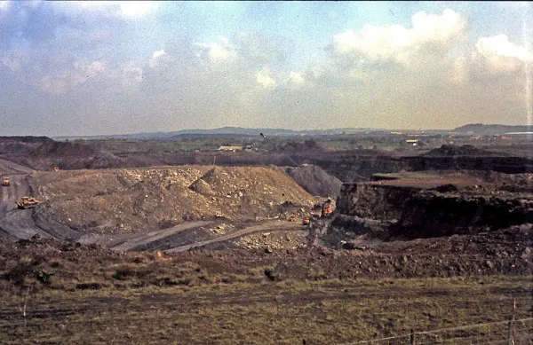Amberswood opencast site in 1983. Mike Smalley A large opencast mine with bright orange machinery